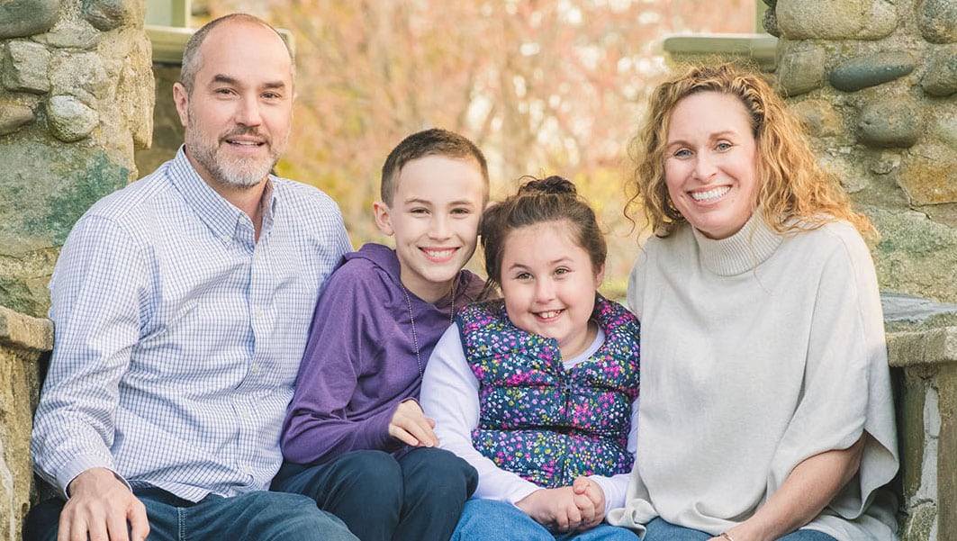 The Edwards family, left-to-right, father, two children, mother
