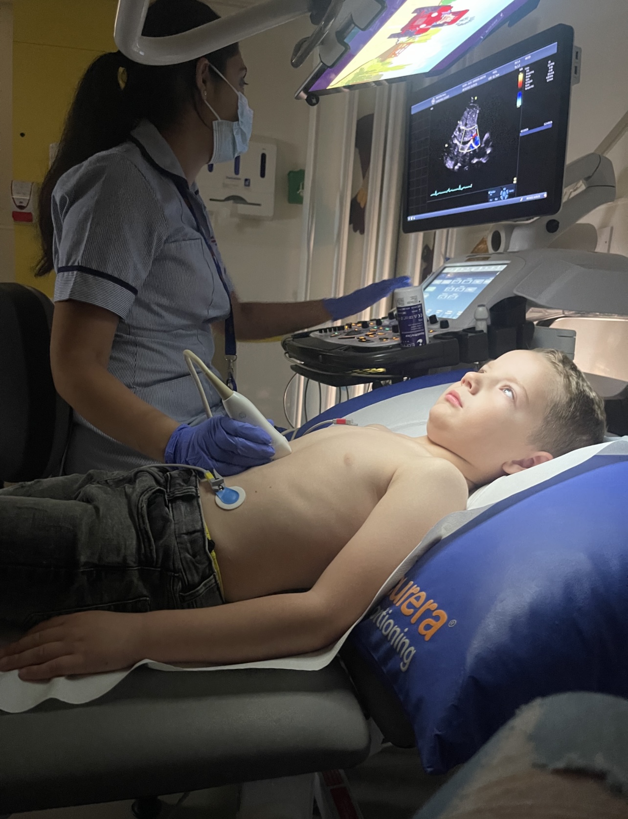 Henry receiving an echo cardiogram for hypertrophic cardiomyopathy