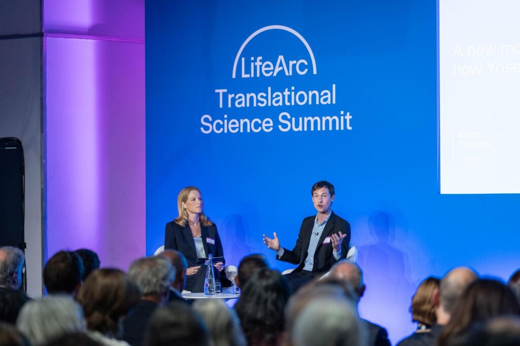 Reed Jobs and Clare Terlouw sat on stage presenting.