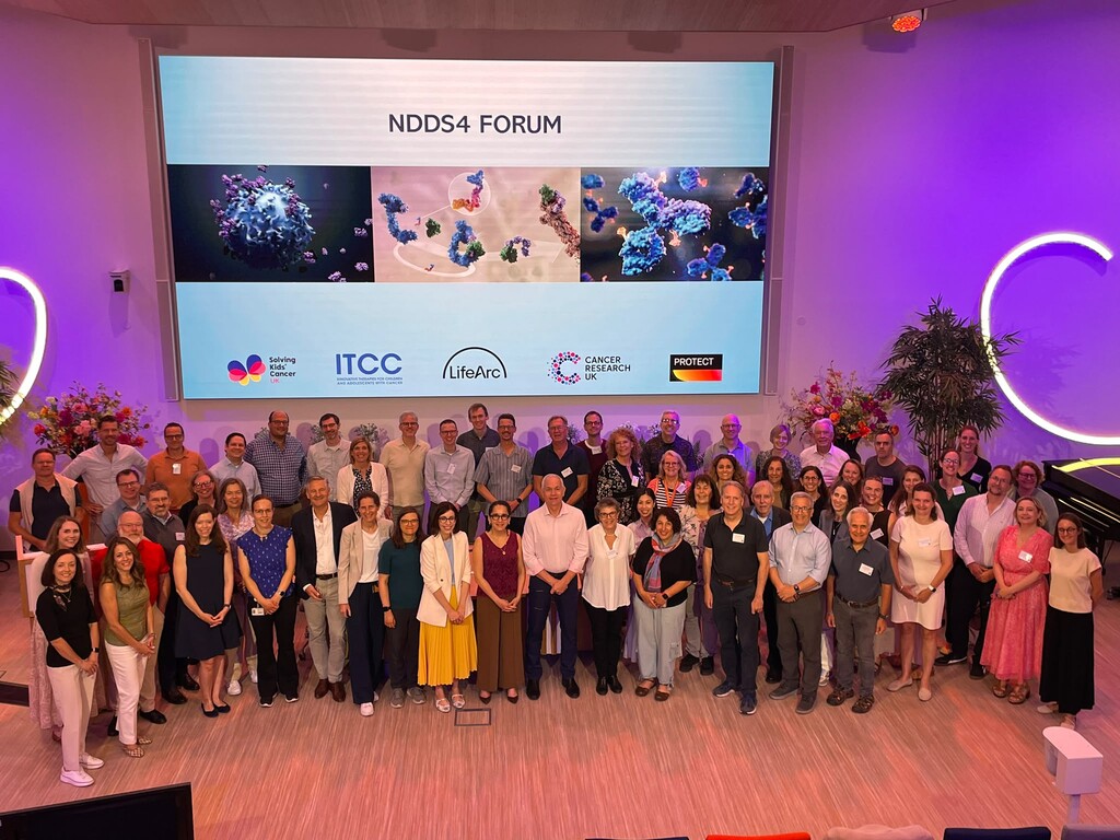 Participants of the workshop standing together smiling.