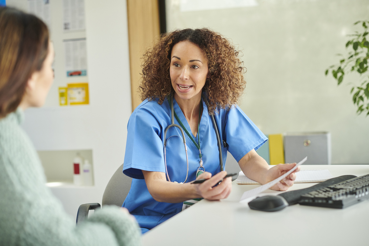 female doctor explaining the treatment